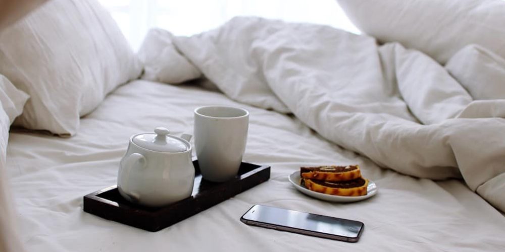 bed-hotel-service-morning-breakfast-room-coffee-break-luxury-hotel-cozy-bed-at-the-hotel_t20_1bOVag